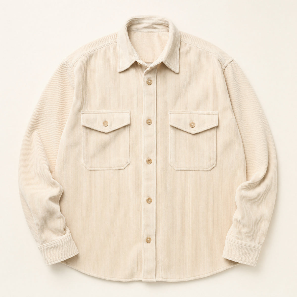 The Bowery Men's Corduroy Overshirt in Cream, flat lay