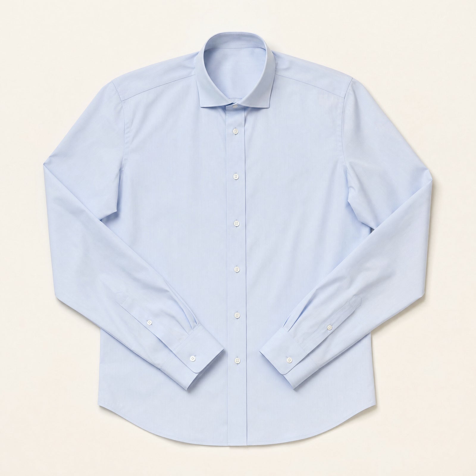 The Gramercy Men's Poplin Dress Shirt in Pale Blue, flat lay