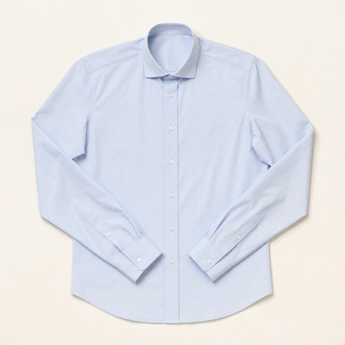 The Gramercy Men's Poplin Dress Shirt in Pale Blue, flat lay